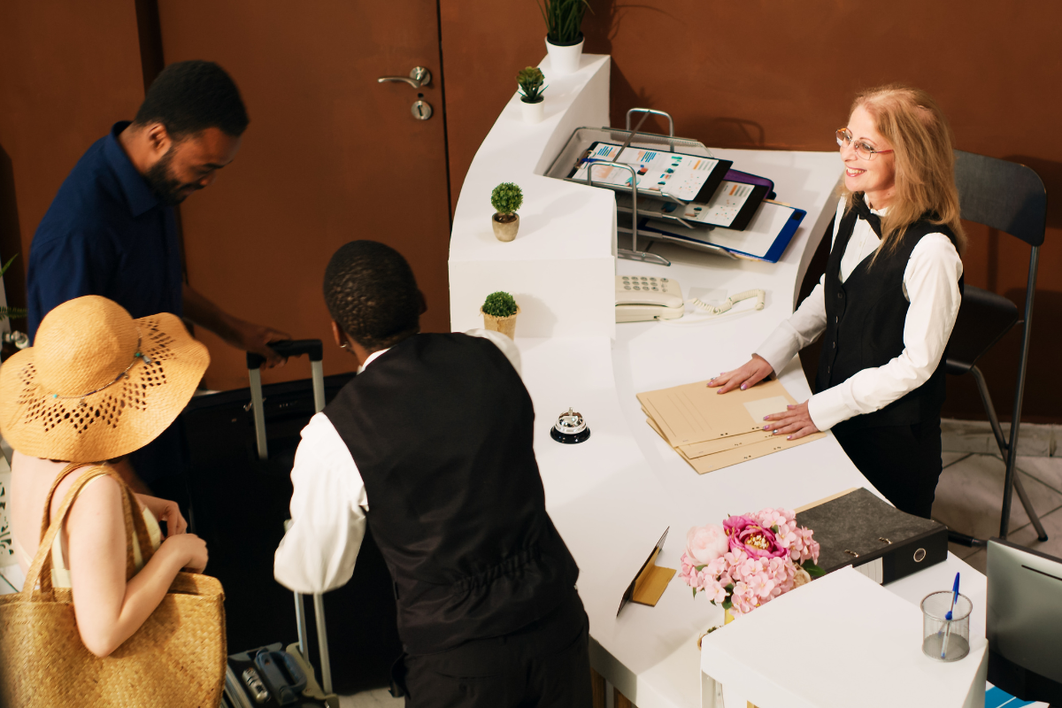 Front office training — trainees practicing guest reception